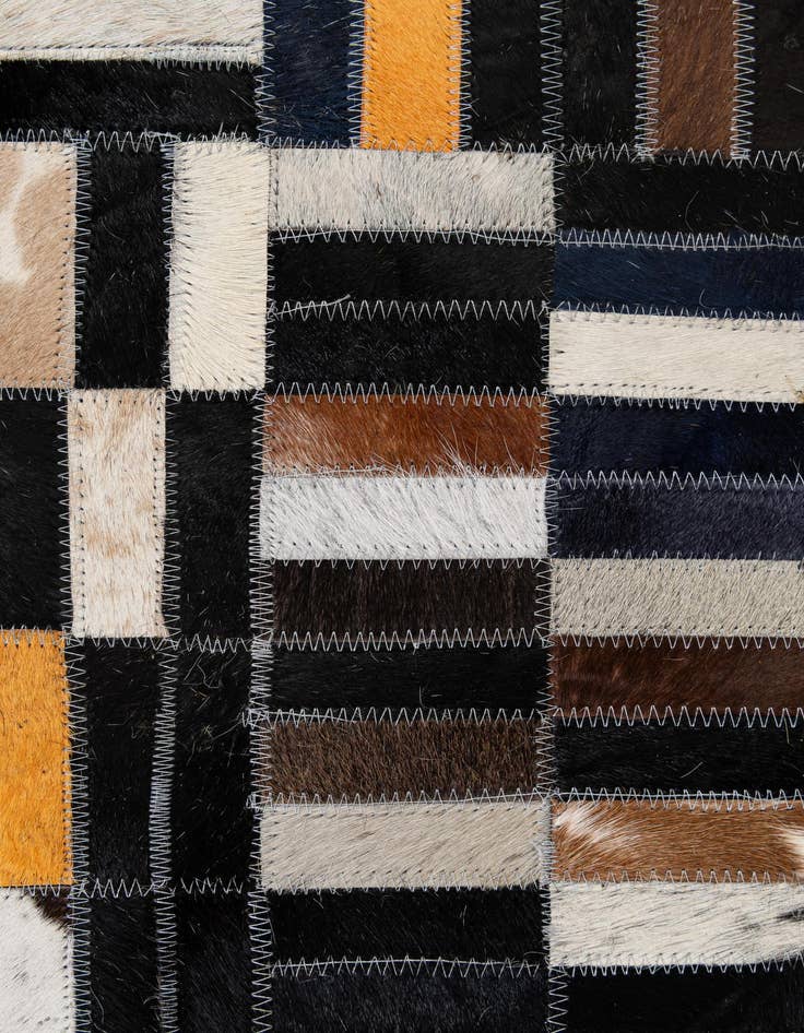 Detail image of  5' 1 x 8' 1 Cowhide - Patchwork Rug
