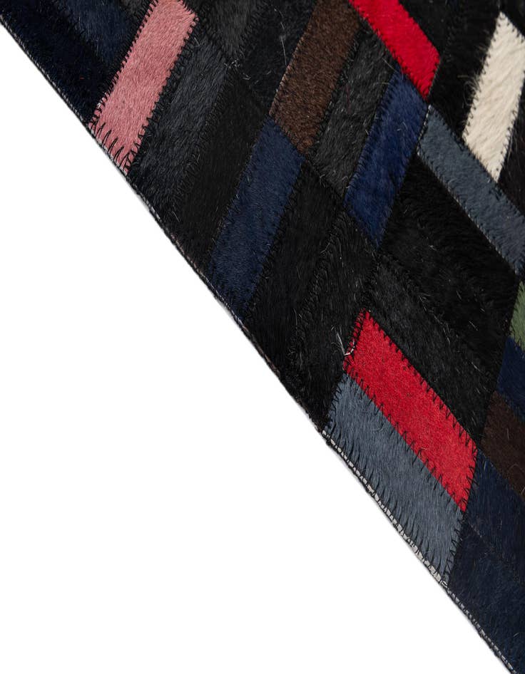 Detail image of  5' 1 x 8' 2 Cowhide - Patchwork Rug