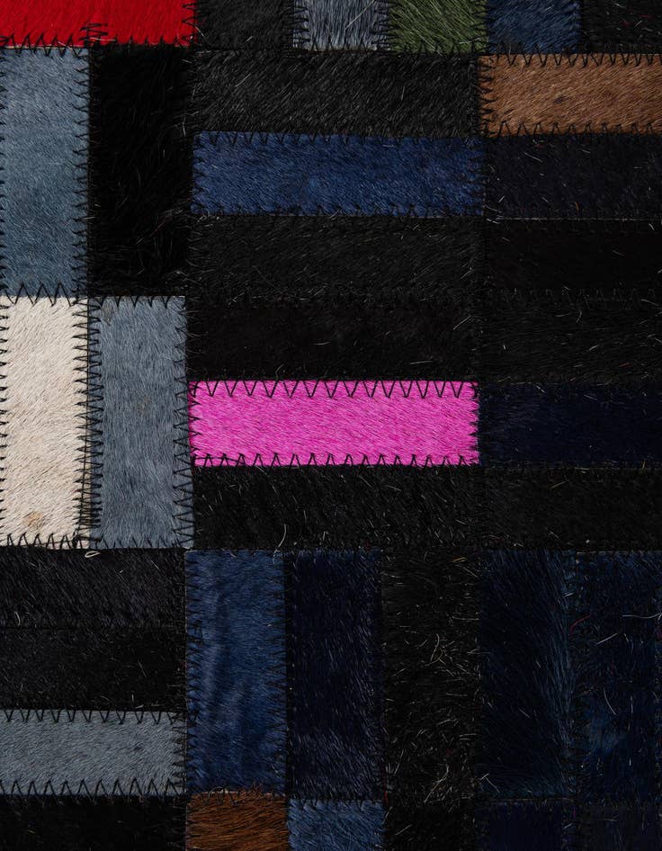Detail image of  5' 1 x 8' 2 Cowhide - Patchwork Rug