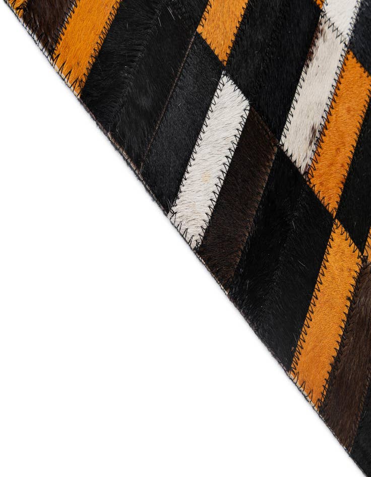Detail image of  5' 3 x 7' 11 Cowhide - Patchwork Rug