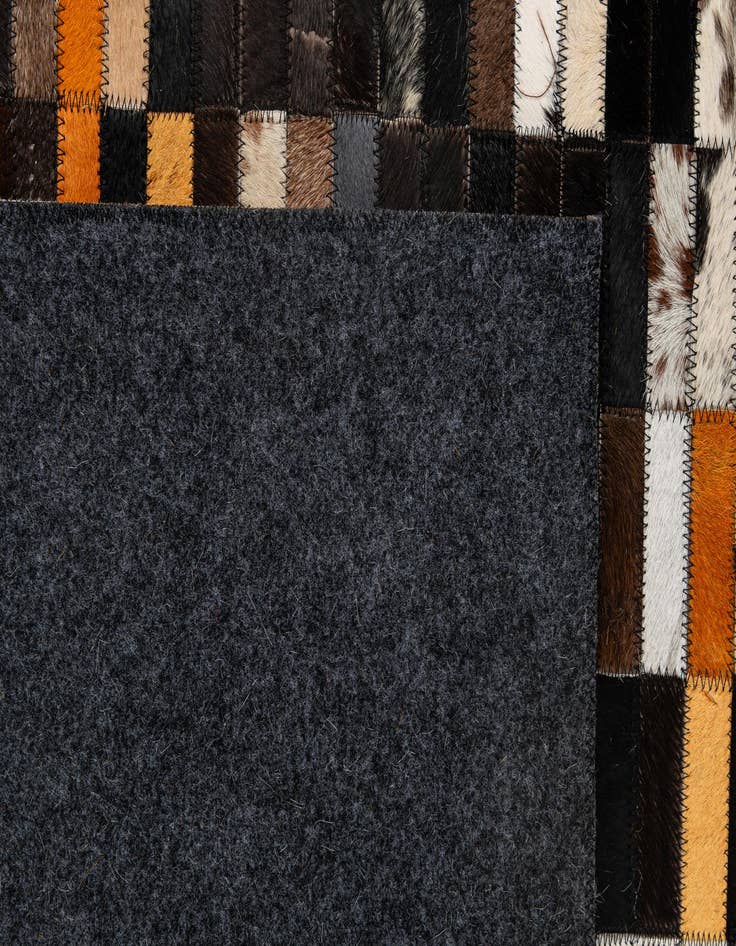Detail image of  5' 3 x 7' 11 Cowhide - Patchwork Rug