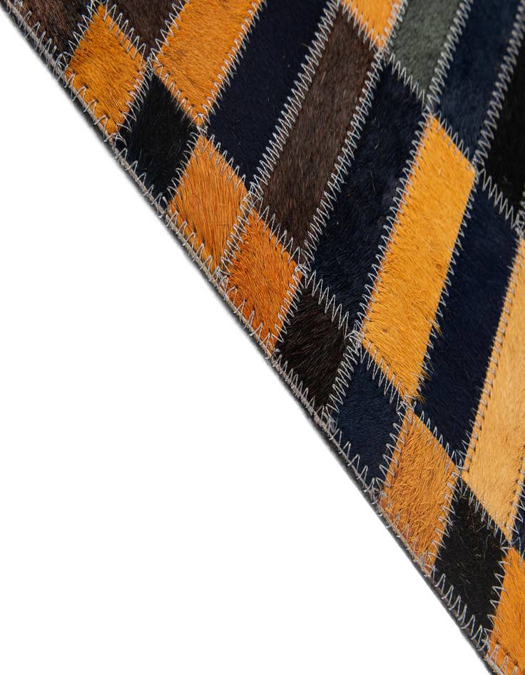 Detail image of  5' 1 x 7' 11 Cowhide - Patchwork Rug