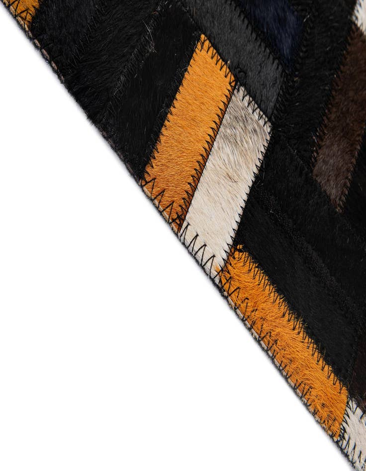 Detail image of  5' 1 x 8' 2 Cowhide - Patchwork Rug