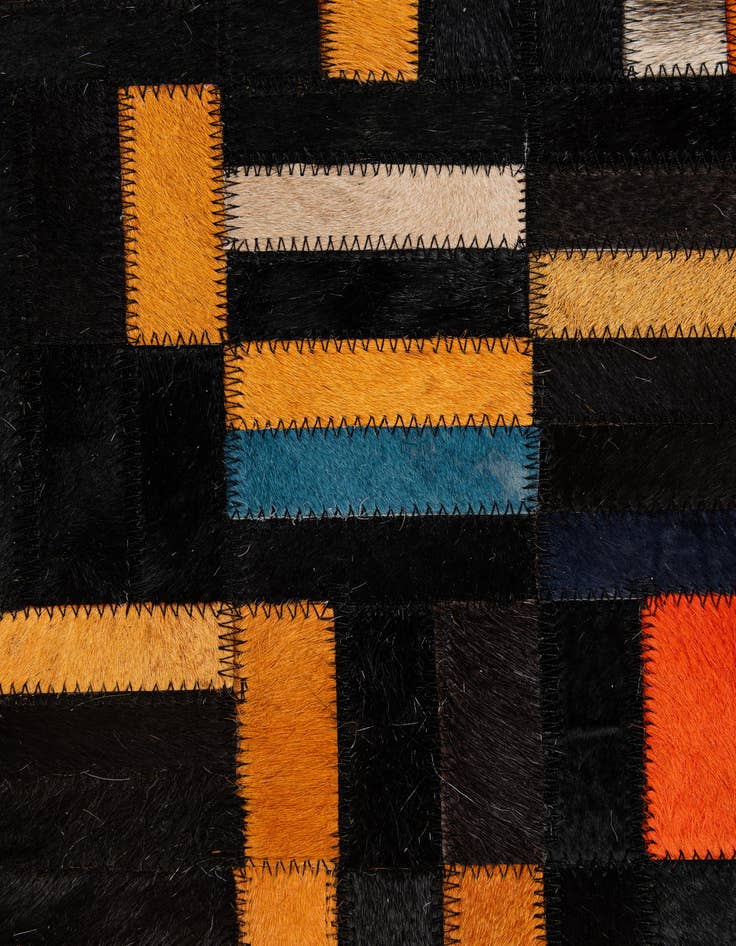 Detail image of  5' 1 x 8' 2 Cowhide - Patchwork Rug