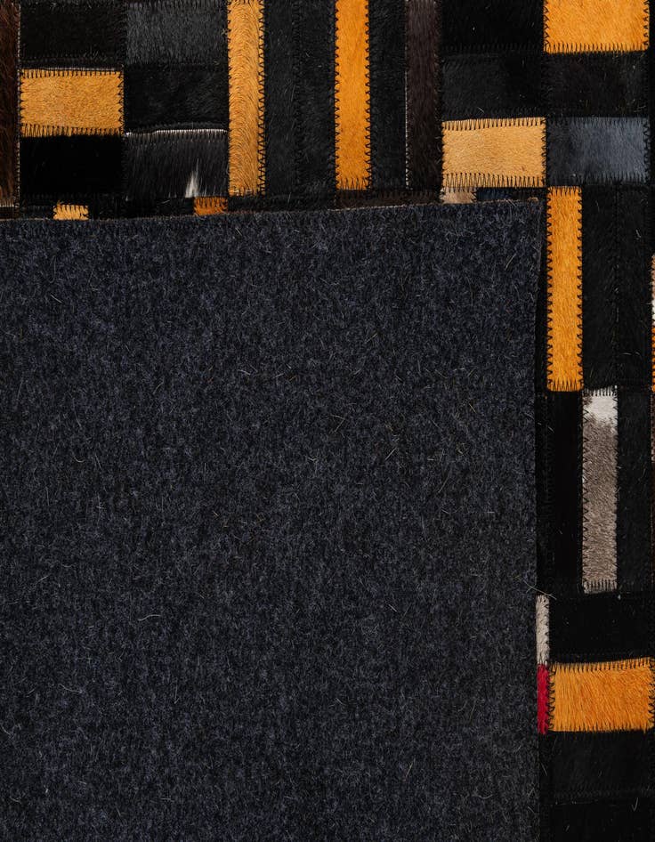 Detail image of  5' 1 x 8' 2 Cowhide - Patchwork Rug