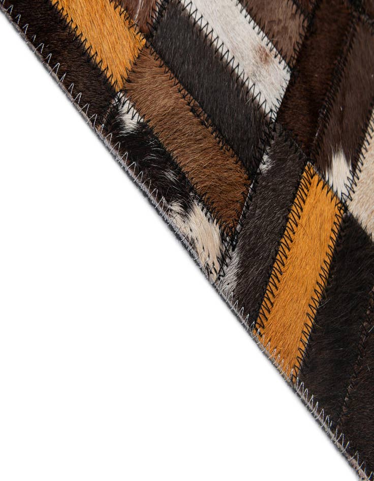 Detail image of  5' 1 x 8' Cowhide - Patchwork Rug