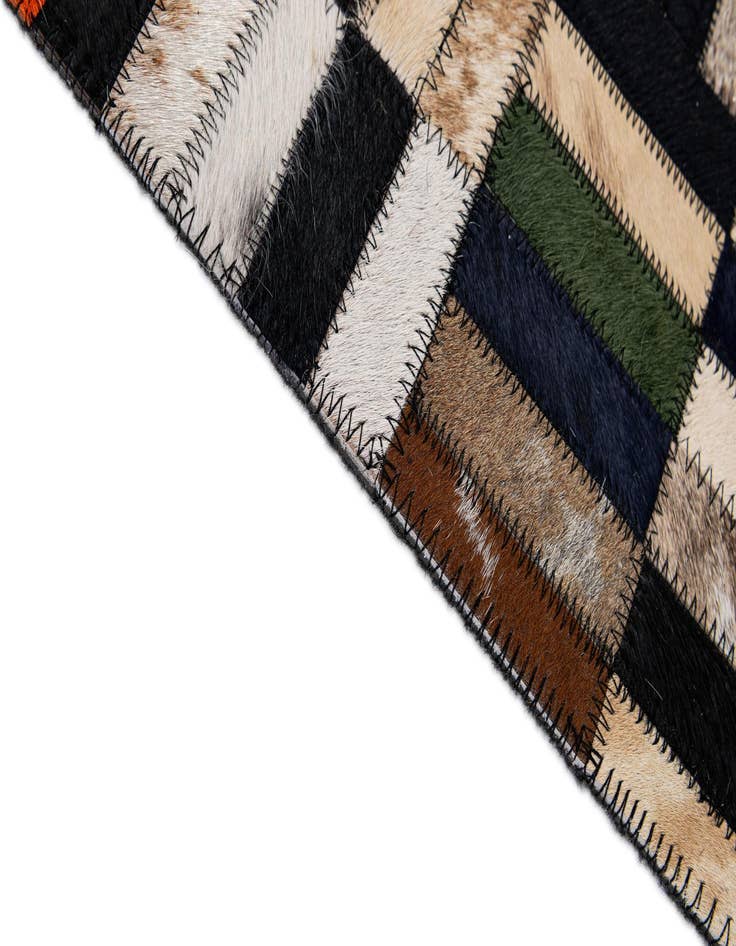 Detail image of  5' 1 x 8' 1 Cowhide - Patchwork Rug