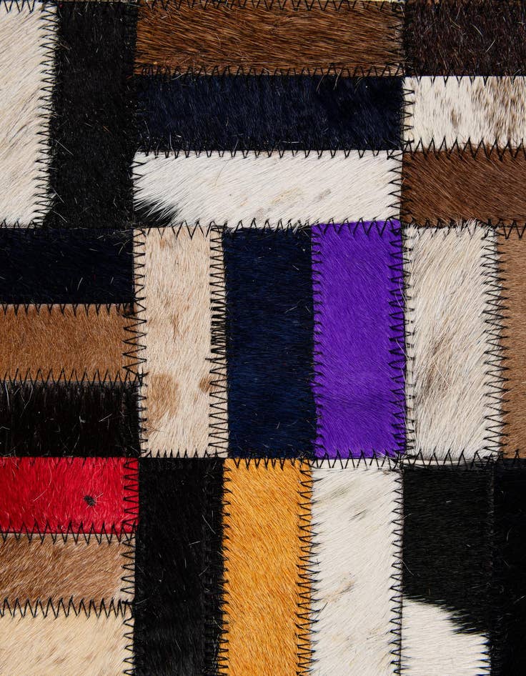 Detail image of  5' 1 x 8' 1 Cowhide - Patchwork Rug
