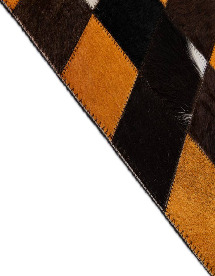 Detail image of  5' 2 x 8' Cowhide - Patchwork Rug