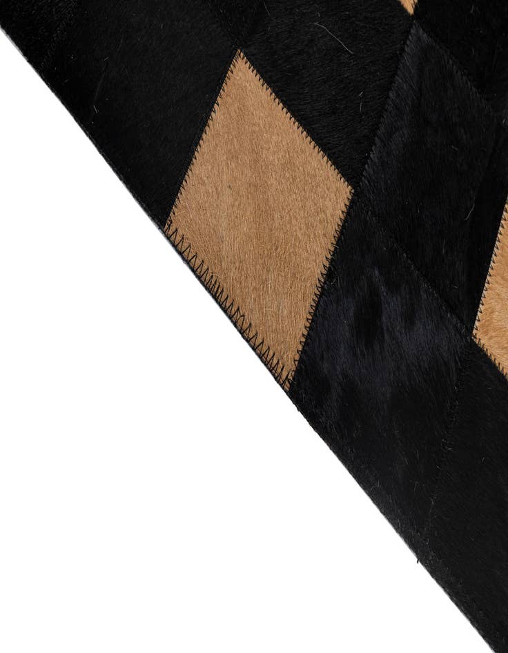 Detail image of  5' x 7' 11 Cowhide - Patchwork Rug
