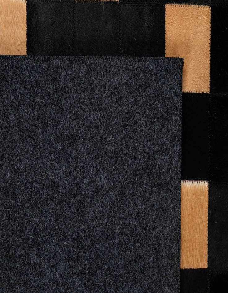 Detail image of  5' x 7' 11 Cowhide - Patchwork Rug