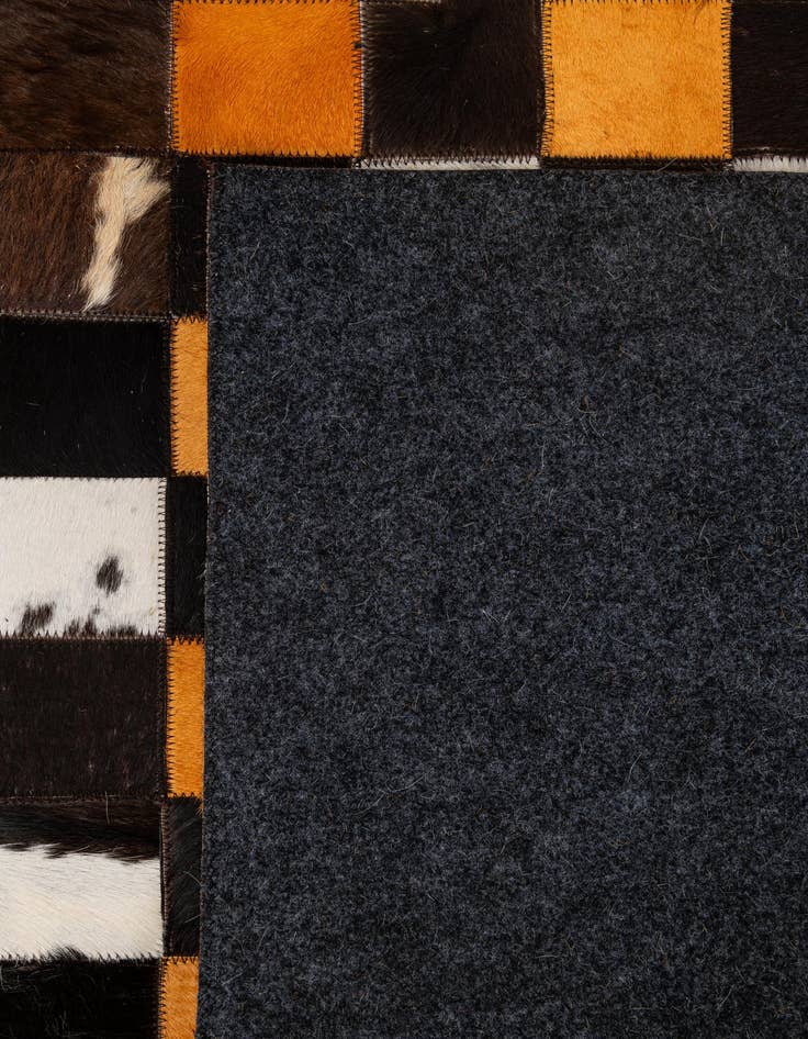Detail image of  5' 2 x 8' Cowhide - Patchwork Rug