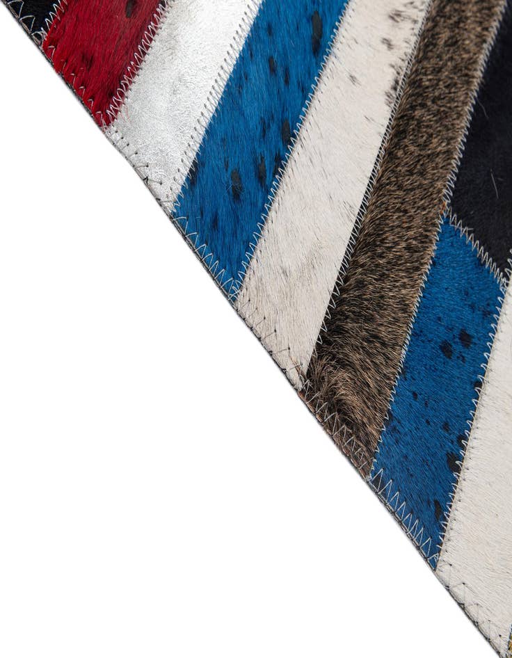 Detail image of  5' 1 x 7' 11 Cowhide - Patchwork Rug