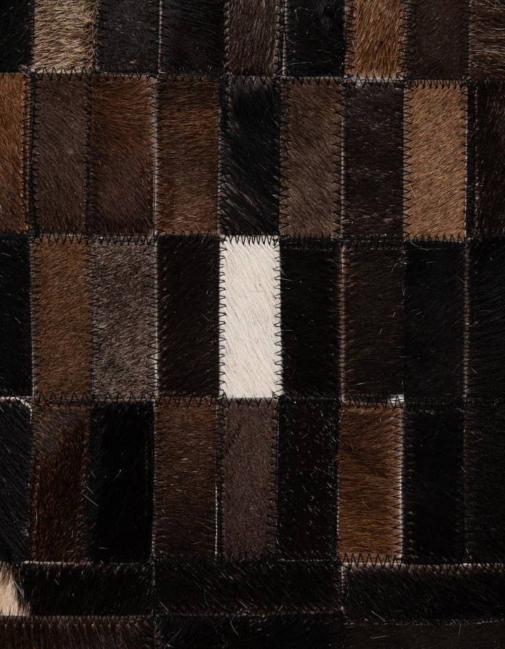 Detail image of  5' 1 x 8' 1 Cowhide - Patchwork Rug