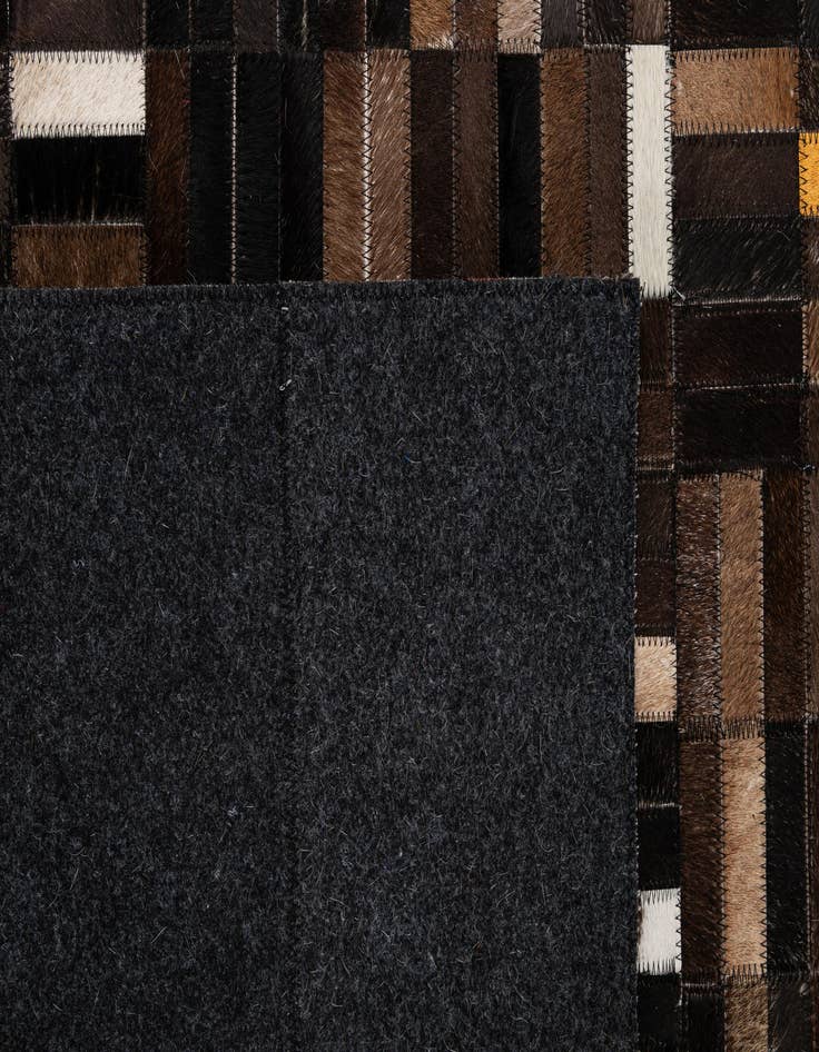 Detail image of  5' 1 x 8' 1 Cowhide - Patchwork Rug