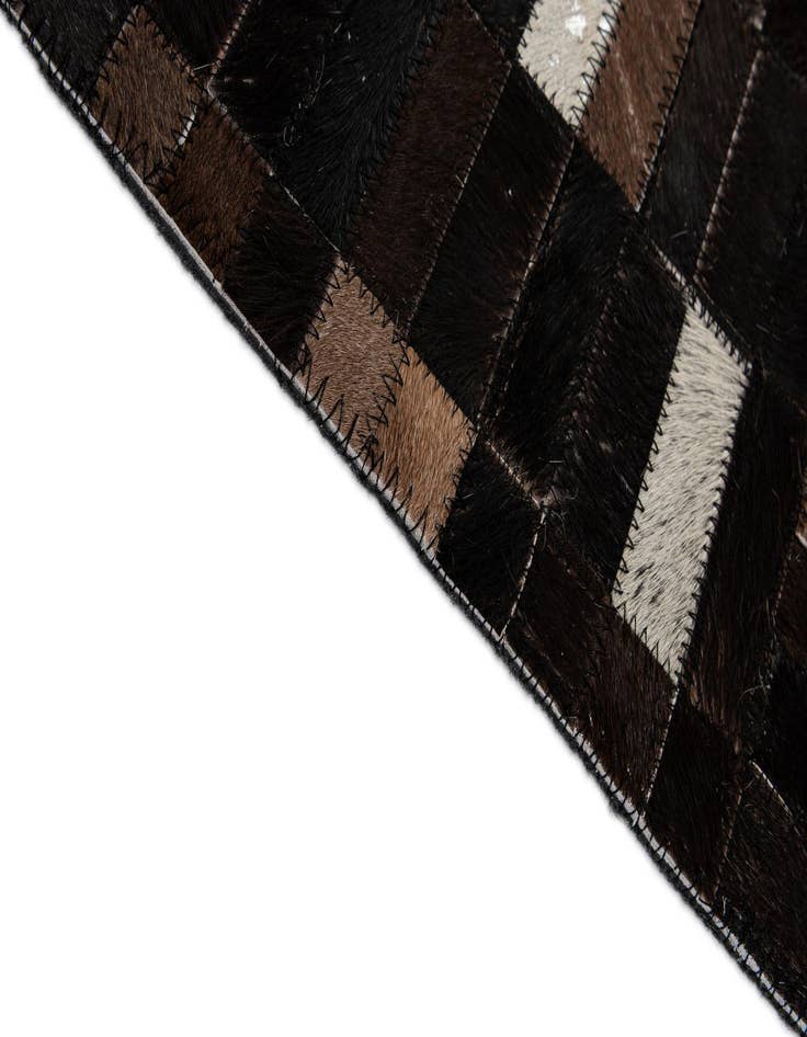 Detail image of  5' 1 x 8' 1 Cowhide - Patchwork Rug