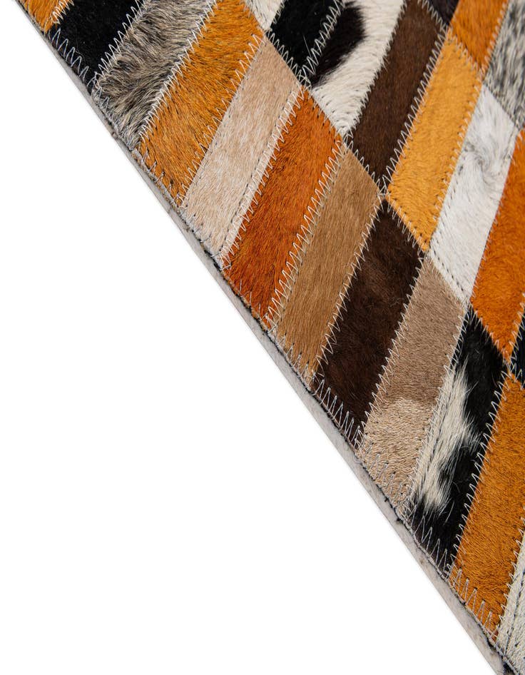 Detail image of  4' 11 x 7' 9 Cowhide - Patchwork Rug