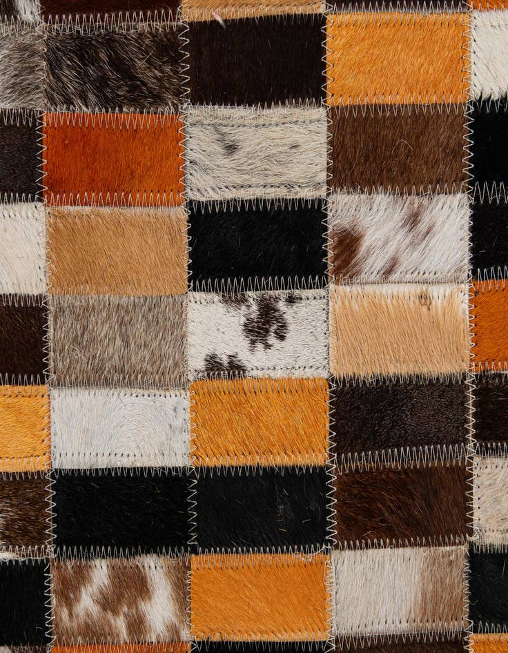 Detail image of  4' 11 x 7' 9 Cowhide - Patchwork Rug