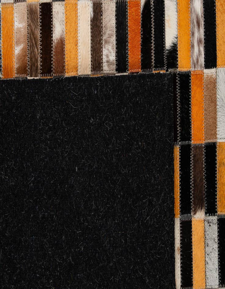 Detail image of  4' 11 x 7' 9 Cowhide - Patchwork Rug