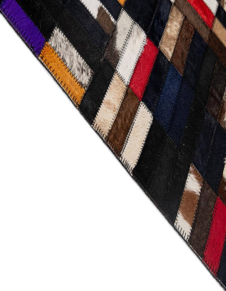 Detail image of  5' 1 x 8' 1 Cowhide - Patchwork Rug