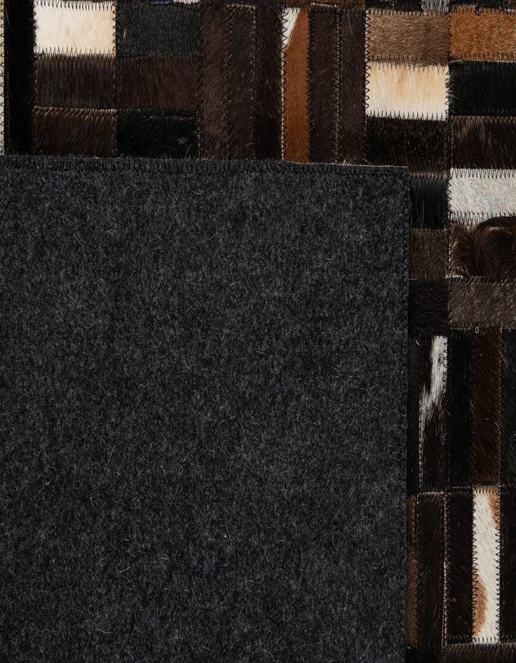 Detail image of  5' 1 x 8' Cowhide - Patchwork Rug