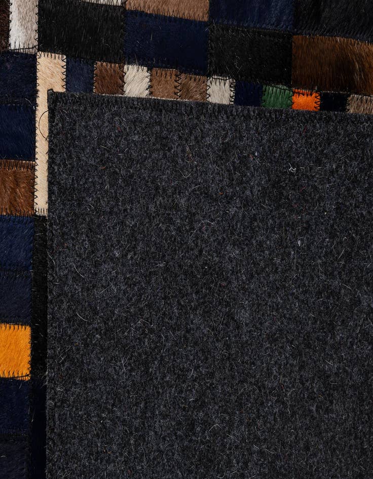 Detail image of  5' 2 x 8' Cowhide - Patchwork Rug