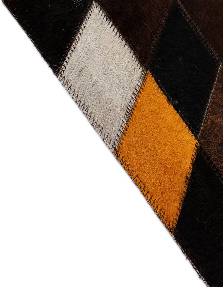 Detail image of  5' 2 x 8' Cowhide - Patchwork Rug