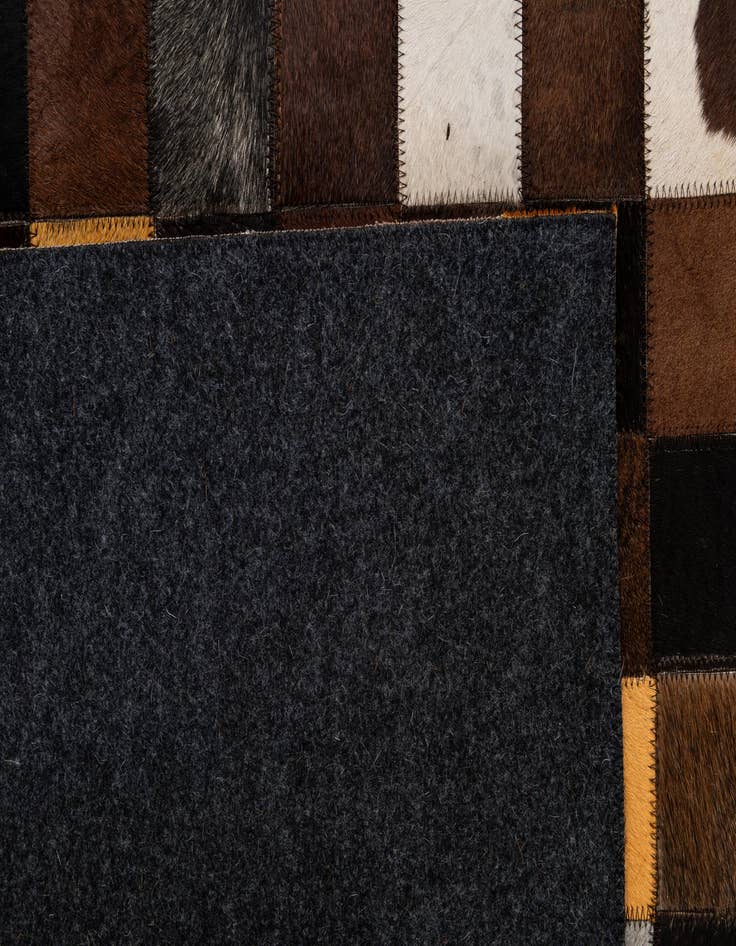 Detail image of  5' 2 x 8' Cowhide - Patchwork Rug