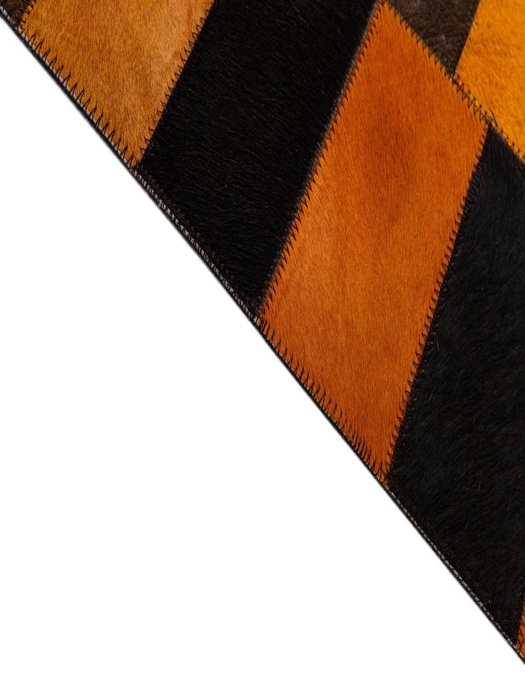 Detail image of  5' 1 x 7' 11 Cowhide - Patchwork Rug