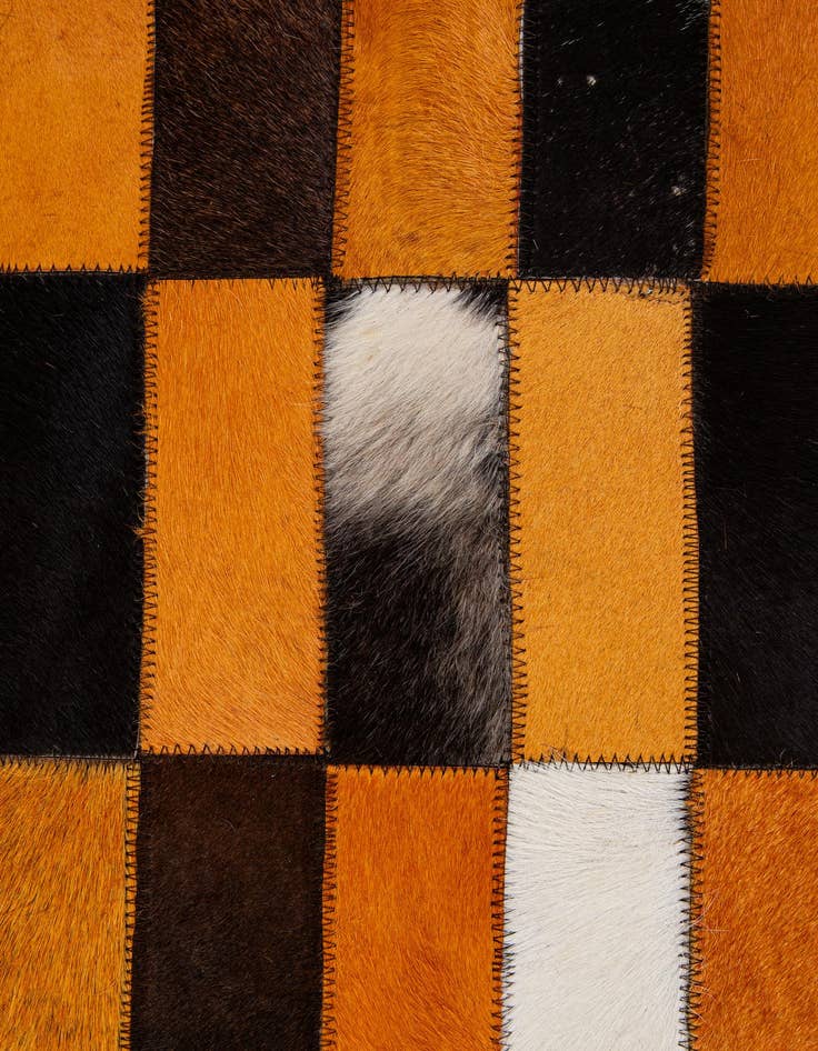 Detail image of  5' 1 x 7' 11 Cowhide - Patchwork Rug