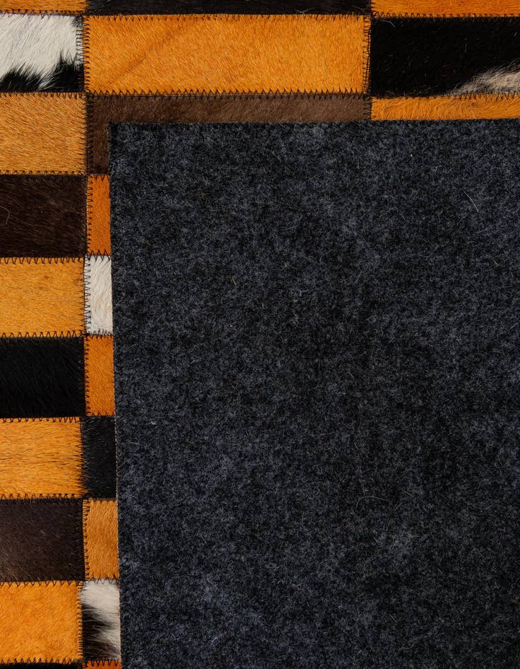 Detail image of  5' 1 x 7' 11 Cowhide - Patchwork Rug