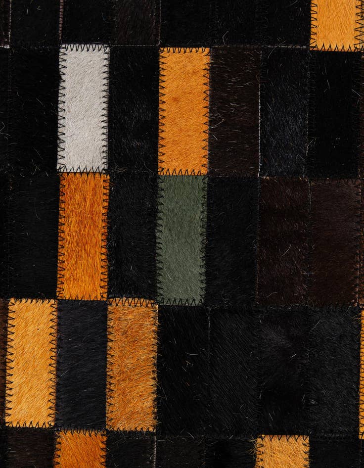 Detail image of  5' 2 x 7' 11 Cowhide - Patchwork Rug