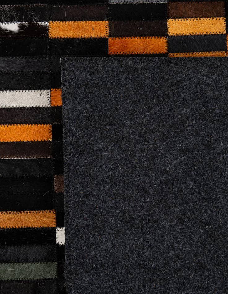 Detail image of  5' 2 x 7' 11 Cowhide - Patchwork Rug