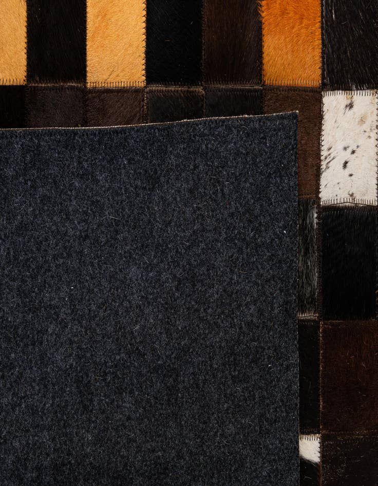 Detail image of  5' 2 x 8' Cowhide - Patchwork Rug