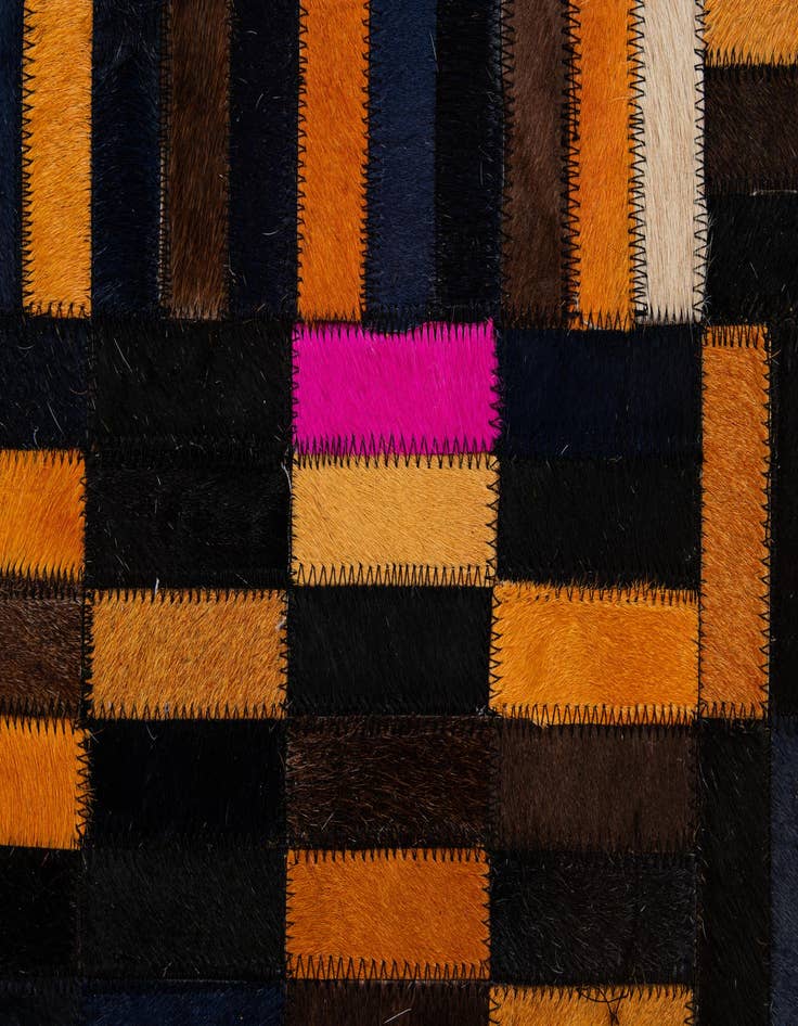 Detail image of  5' 1 x 7' 11 Cowhide - Patchwork Rug