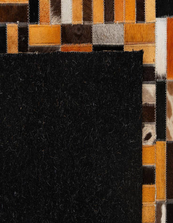 Detail image of  4' 11 x 7' 11 Cowhide - Patchwork Rug