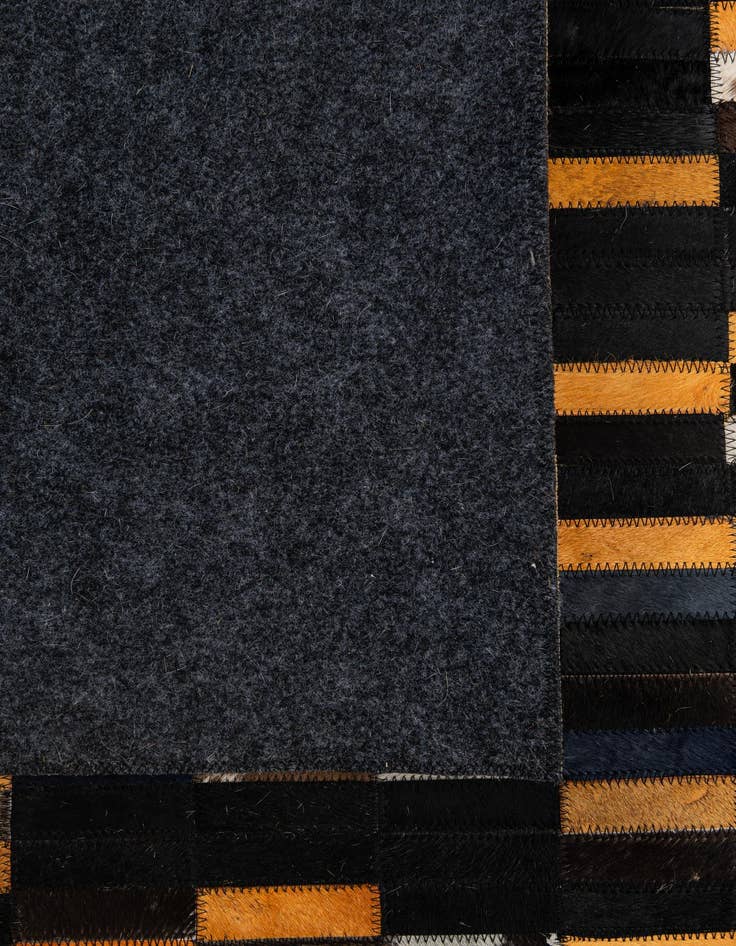 Detail image of  5' 2 x 8' Cowhide - Patchwork Rug