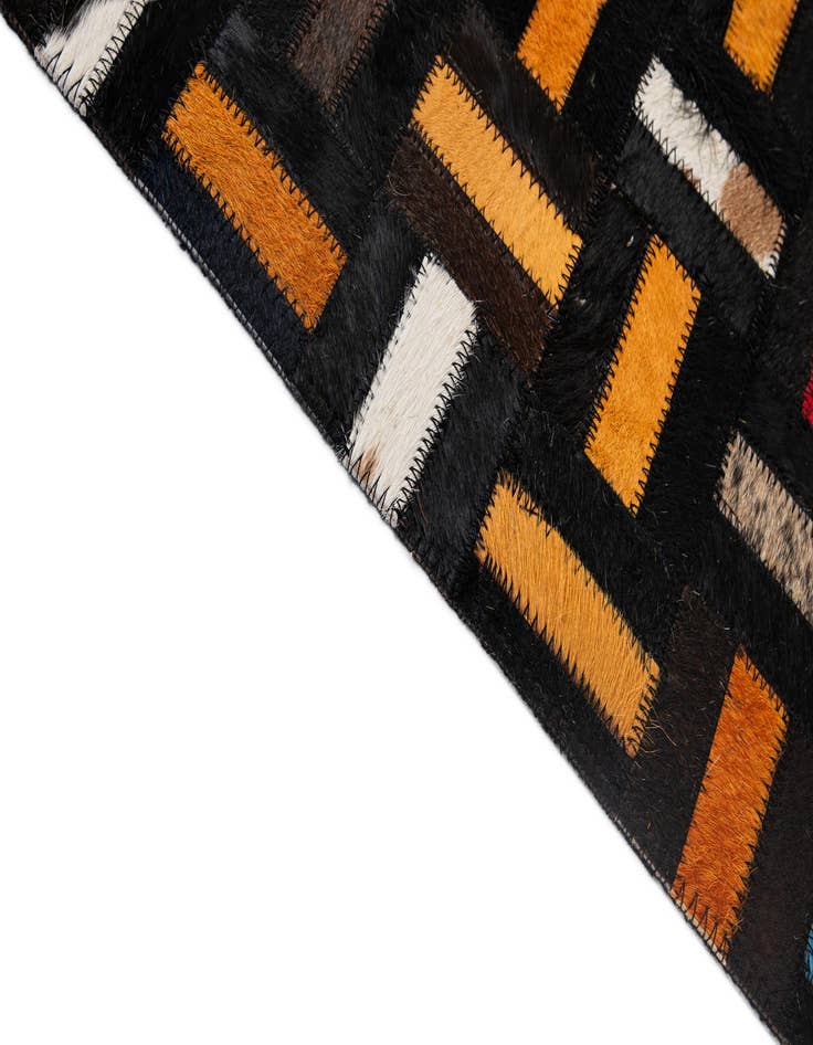 Detail image of  4' 11 x 7' 10 Cowhide - Patchwork Rug