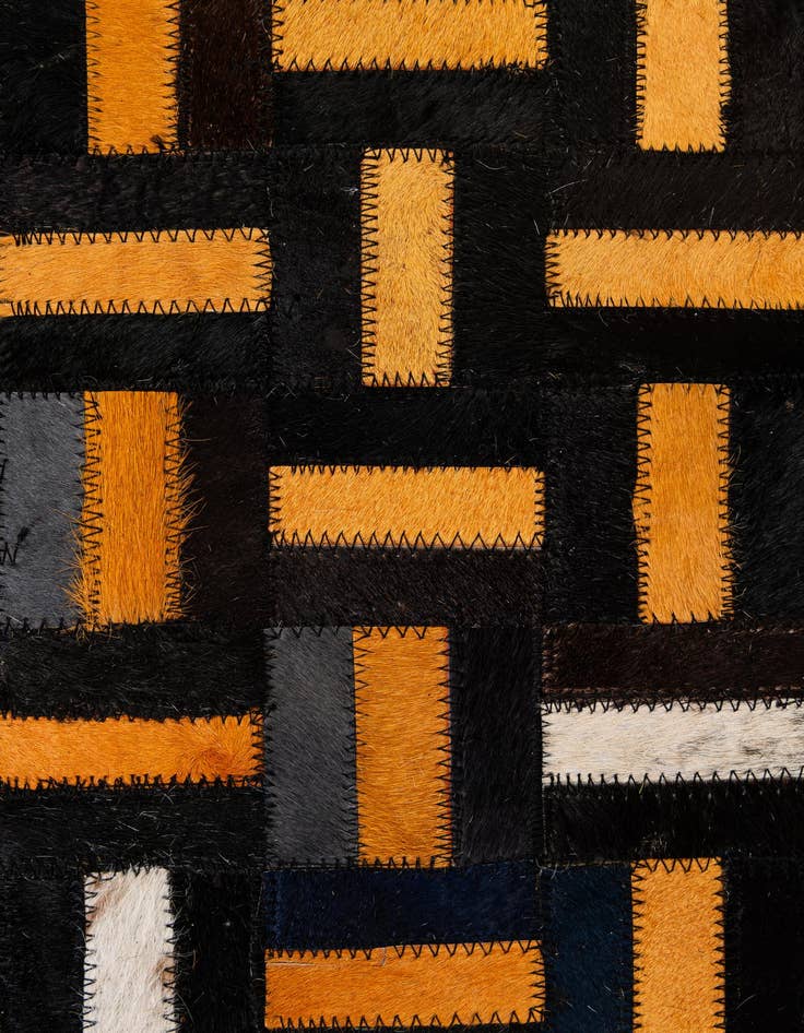 Detail image of  4' 11 x 7' 10 Cowhide - Patchwork Rug