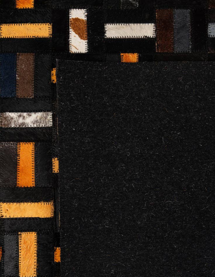 Detail image of  4' 11 x 7' 10 Cowhide - Patchwork Rug