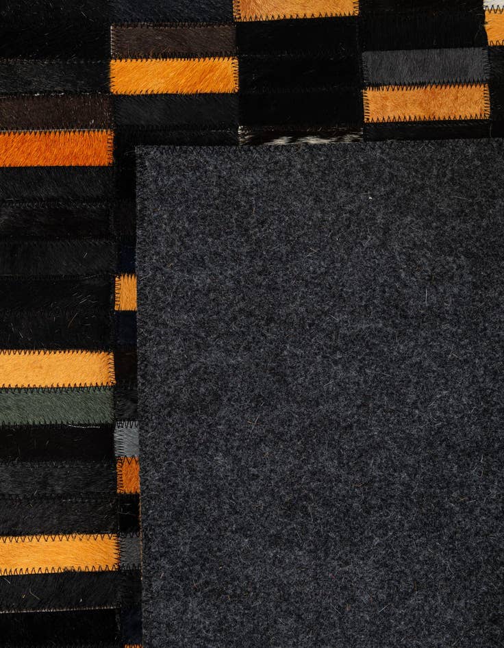 Detail image of  5' 2 x 8' Cowhide - Patchwork Rug