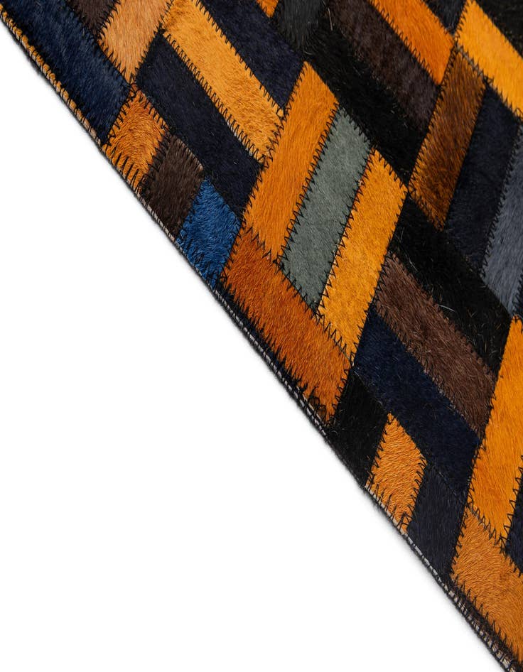 Detail image of  5' 1 x 7' 11 Cowhide - Patchwork Rug