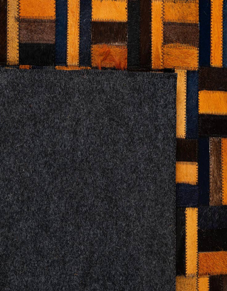 Detail image of  5' 1 x 7' 11 Cowhide - Patchwork Rug