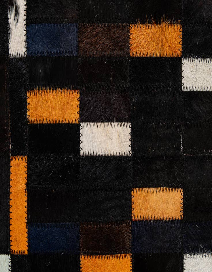 Detail image of  5' 2 x 7' 11 Cowhide - Patchwork Rug