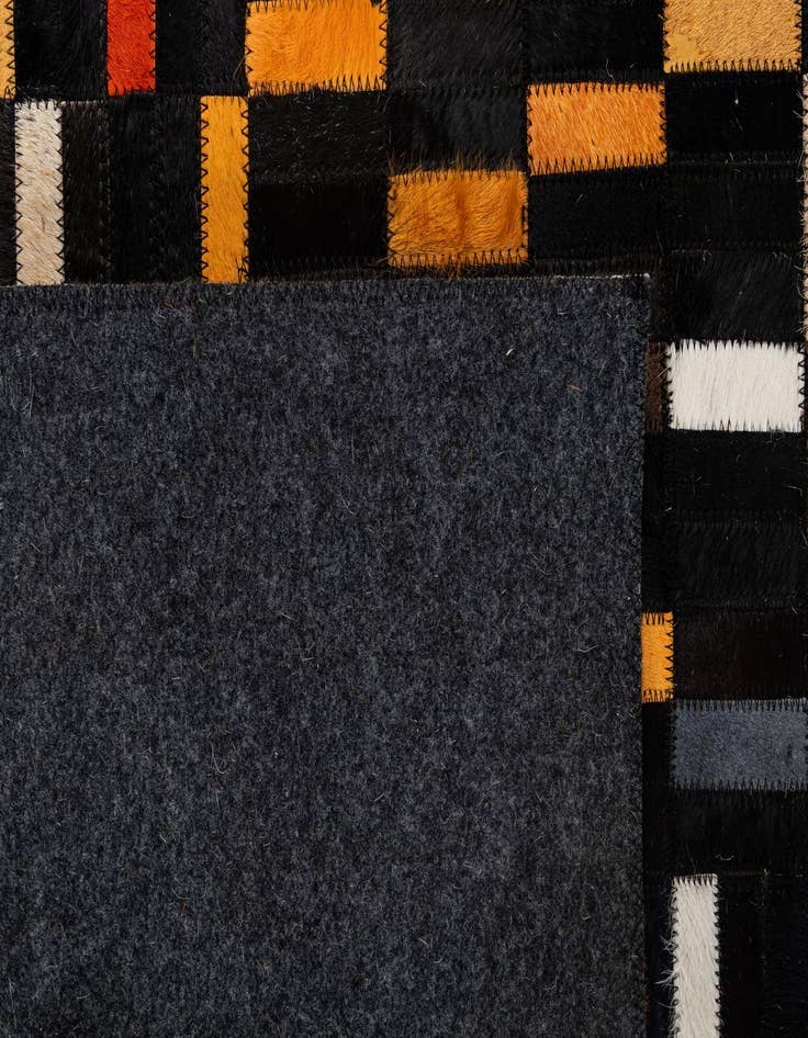 Detail image of  5' 2 x 7' 11 Cowhide - Patchwork Rug