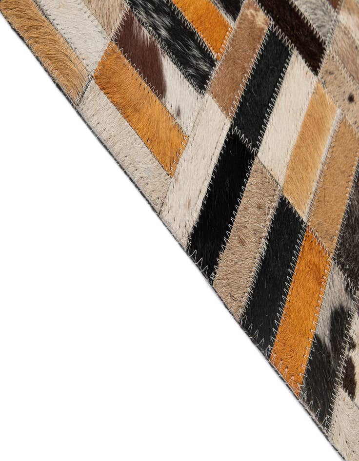 Detail image of  5' x 7' 11 Cowhide - Patchwork Rug