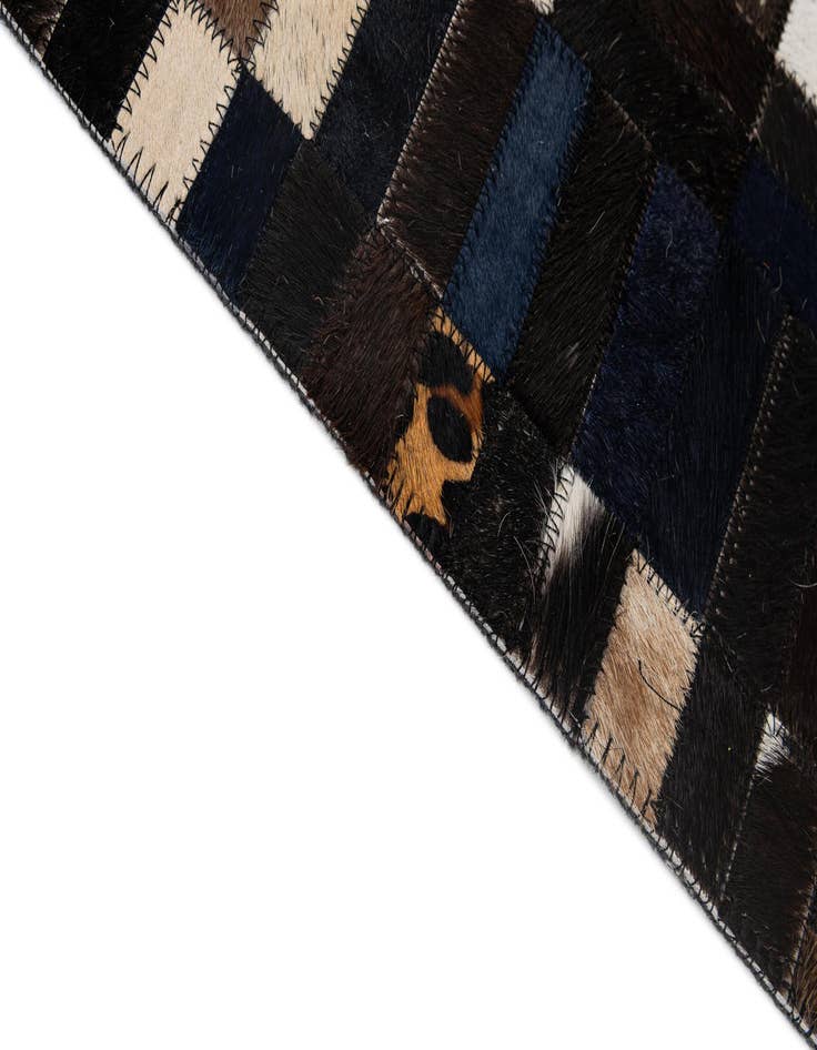 Detail image of  5' 1 x 8' Cowhide - Patchwork Rug
