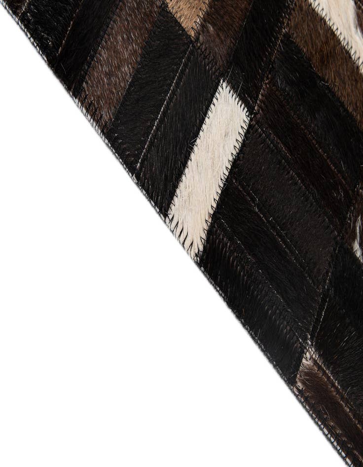 Detail image of  5' 1 x 8' Cowhide - Patchwork Rug