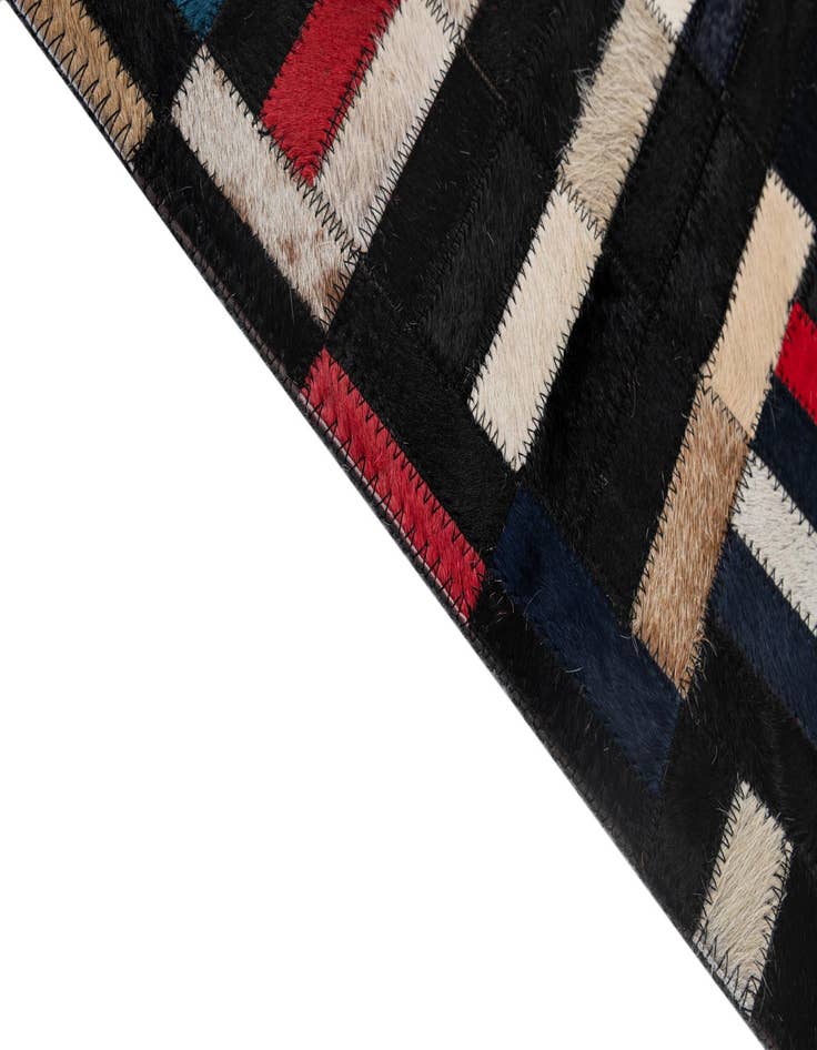Detail image of  5' 1 x 8' 1 Cowhide - Patchwork Rug