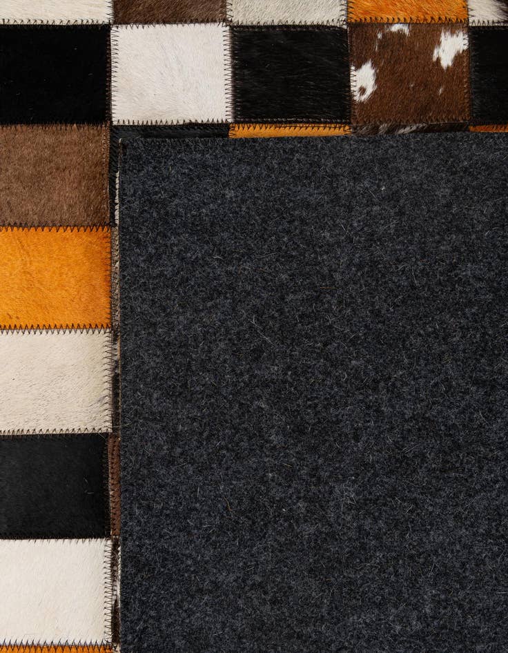 Detail image of  5' 2 x 8' Cowhide - Patchwork Rug